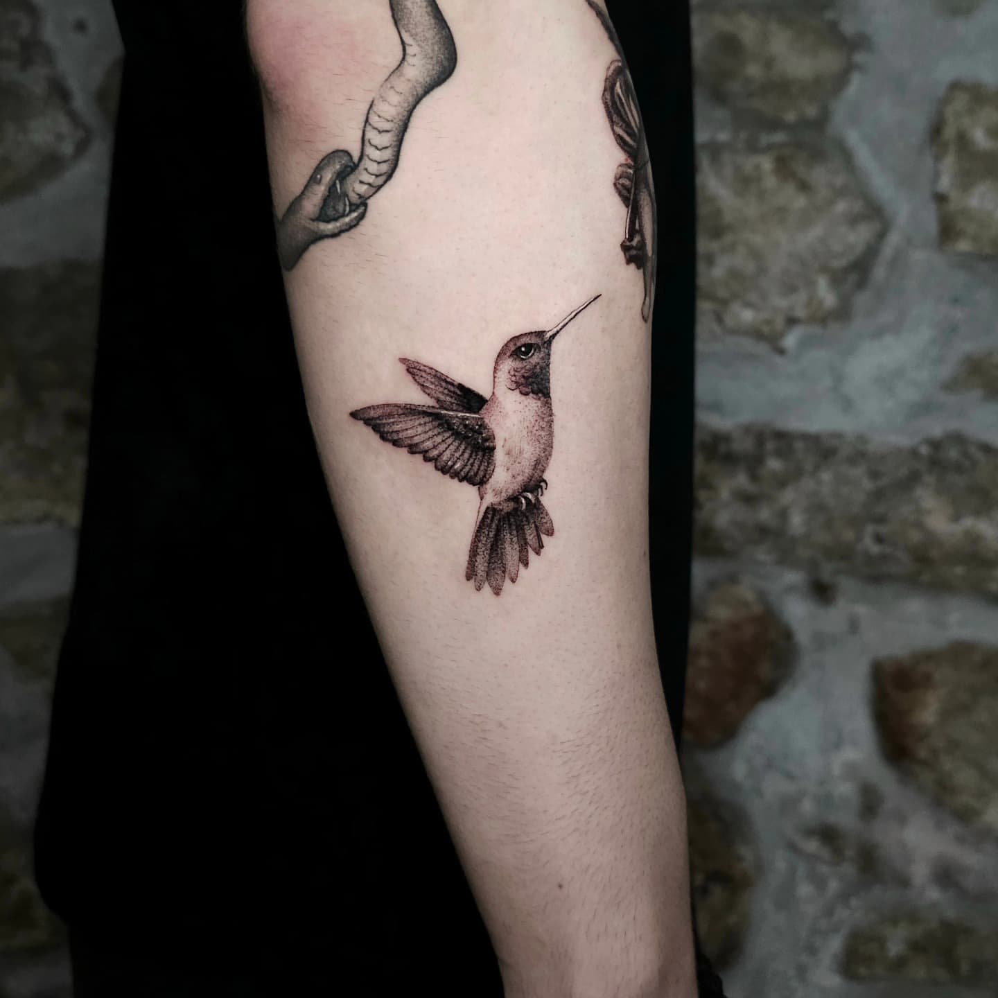Fine-line hummingbird tattoo by Lex
